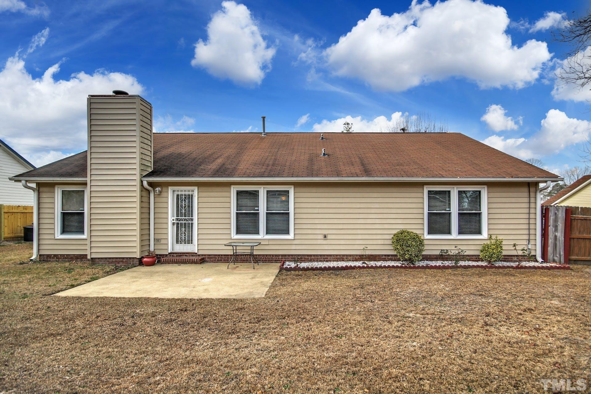 813 Rim Road Fayetteville, NC 28314 - Photo 21 of 25 a view of a house with a yard