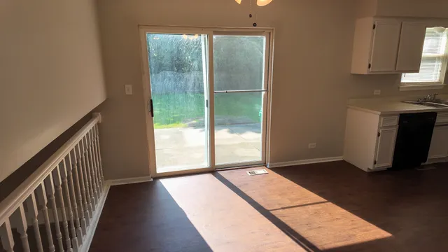 a view of hallway with windows