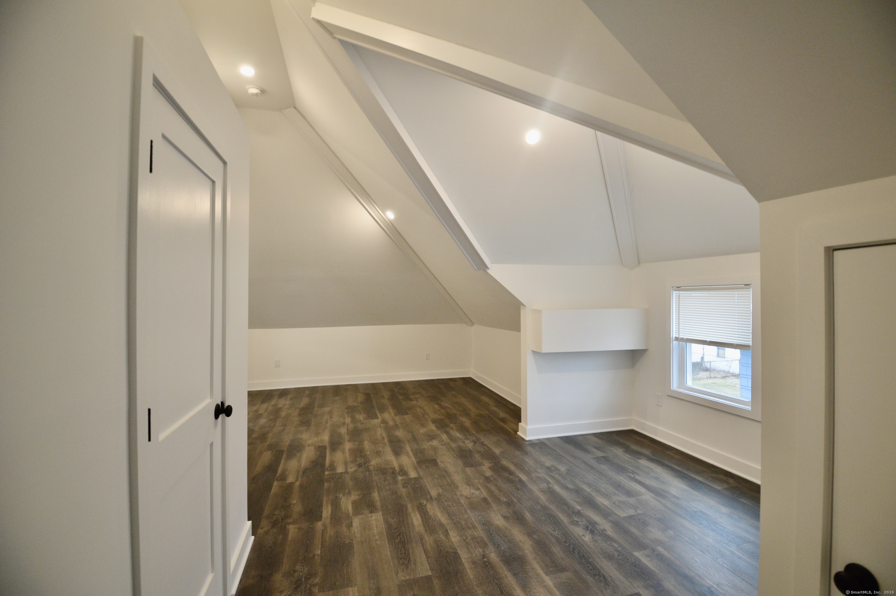 21 Nichols Street Ansonia, CT 06401 - Photo 13 of 21 wooden floor in an empty room with a window