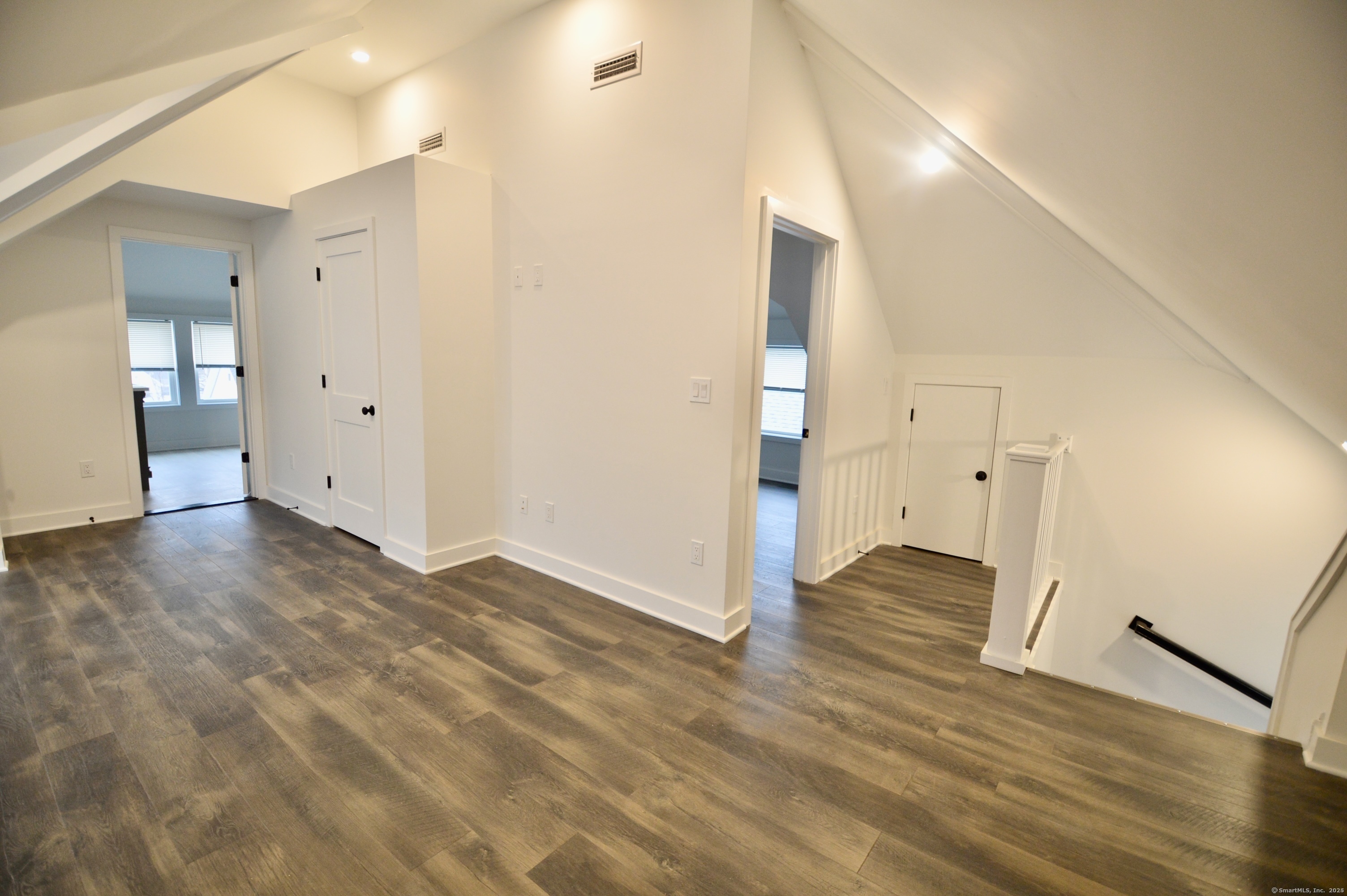 21 Nichols Street Ansonia, CT 06401 - Photo 9 of 21 a view of empty room with wooden floor