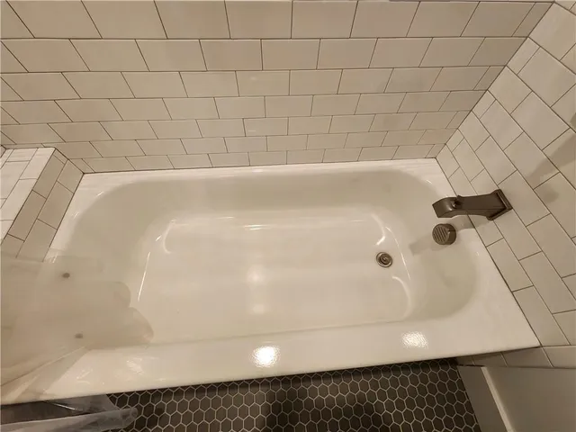 a bathroom with a bathtub