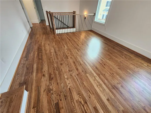 a view of entryway with wooden floor