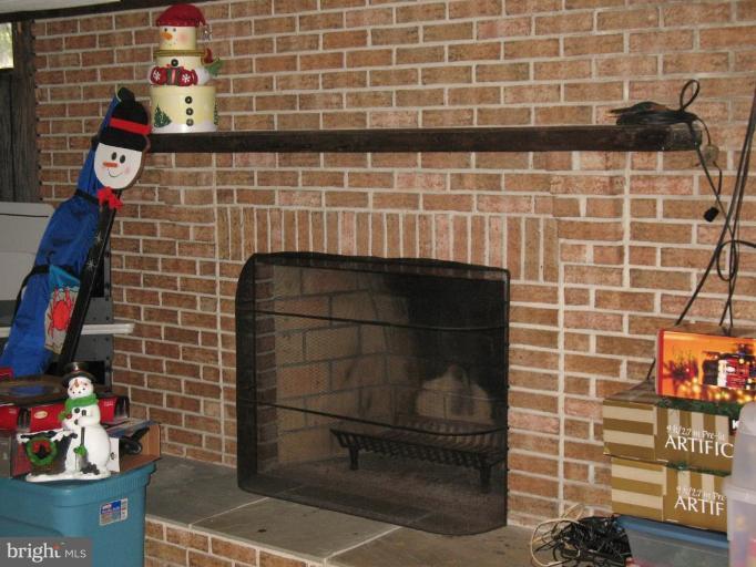 202 Eastern Road Pasadena, MD 21122 - Photo 14 of 28 2ND WOODBURNING FIREPLACE IN FAMILY ROOM
