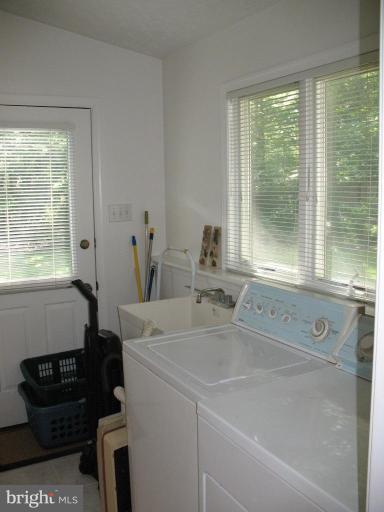 202 Eastern Road Pasadena, MD 21122 - Photo 5 of 28 SEPERATE LAUNDRY ROOM/MUD ROOM LEADS TO BACK DECK