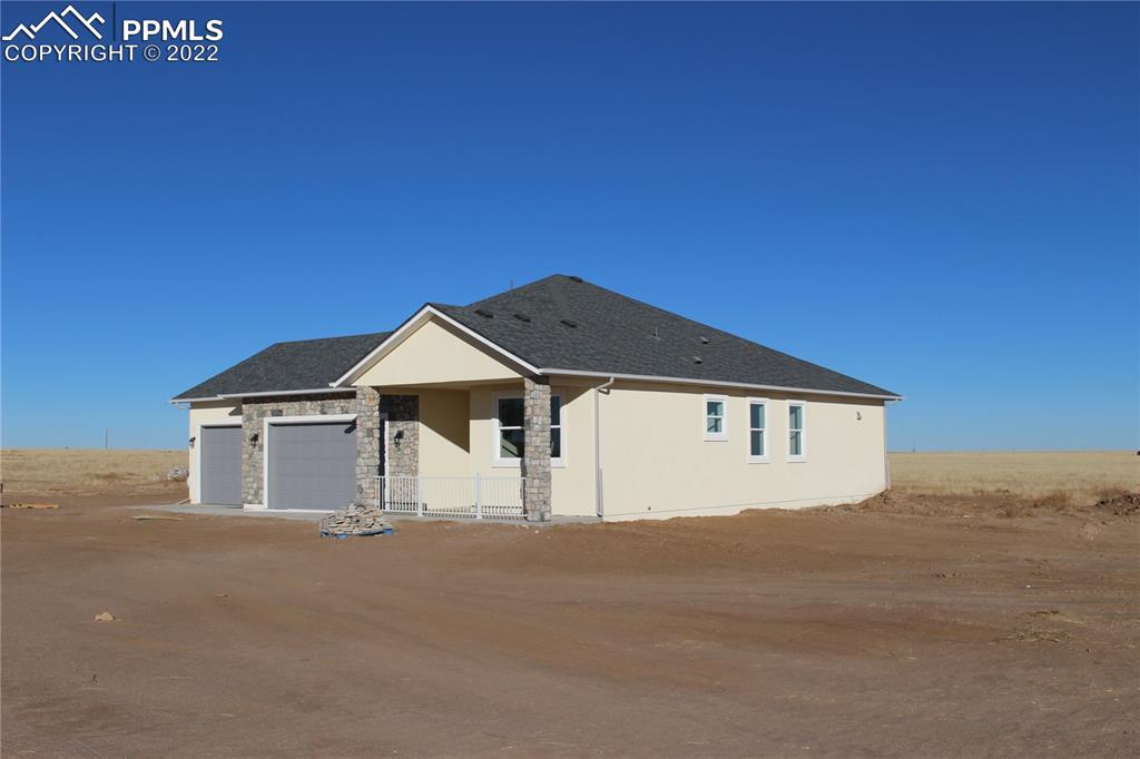 3755 North Rush Road Rush, CO 80833 - Photo 2 of 11 a house with a outdoor space