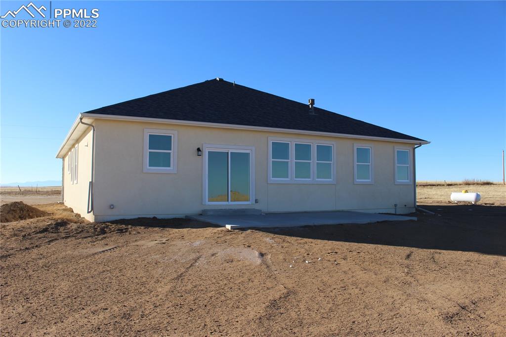 3755 North Rush Road Rush, CO 80833 - Photo 4 of 11 a front view of a house with a yard