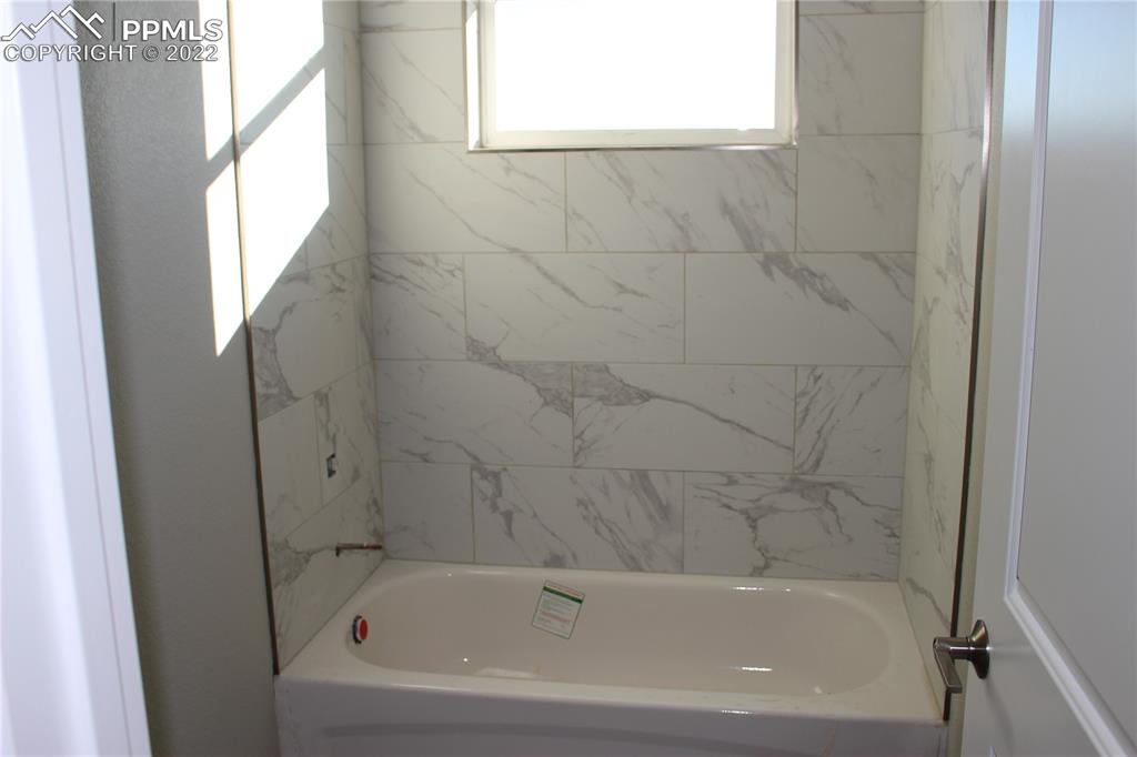 3755 North Rush Road Rush, CO 80833 - Photo 5 of 11 a bathroom with a bathtub