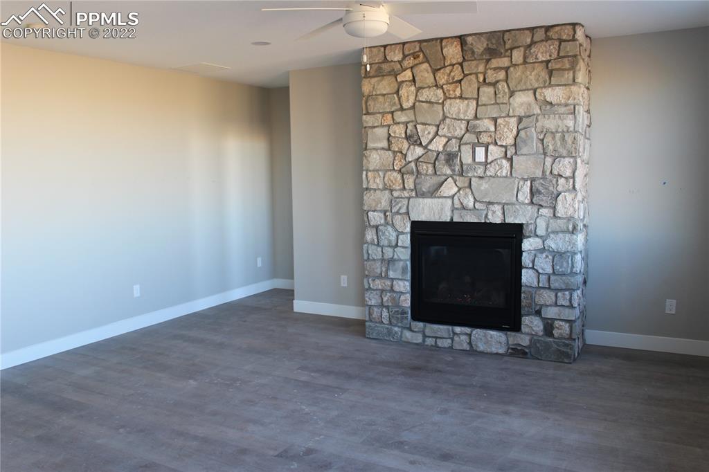 3755 North Rush Road Rush, CO 80833 - Photo 9 of 11 a room with a fireplace