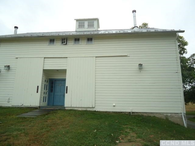 974 Old Post Road Kinderhook, NY 12106 - Photo 2 of 10 a view of a patio with a yard