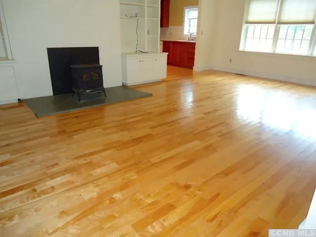 a view of an empty room and window