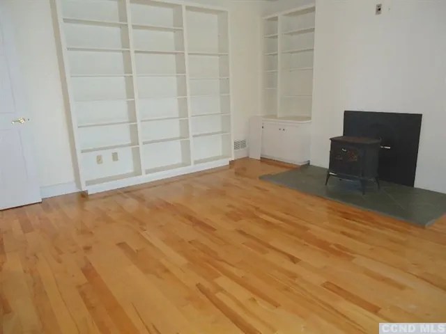 an empty room with cabinet