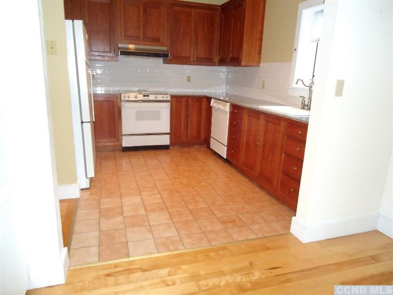 974 Old Post Road Kinderhook, NY 12106 - Photo 5 of 10 a kitchen with a sink and a stove