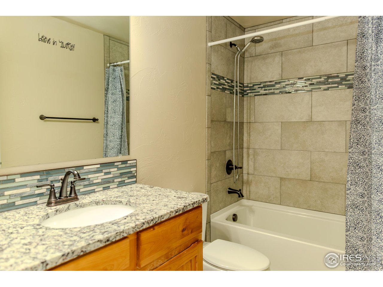 1111 Bison Way Wiggins, CO 80654 - Photo 27 of 41 Main Level Guest Bathroom