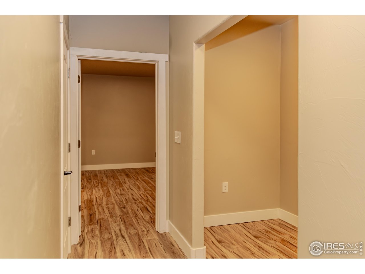 1111 Bison Way Wiggins, CO 80654 - Photo 4 of 41 Basement Hall and Open Office Nook!