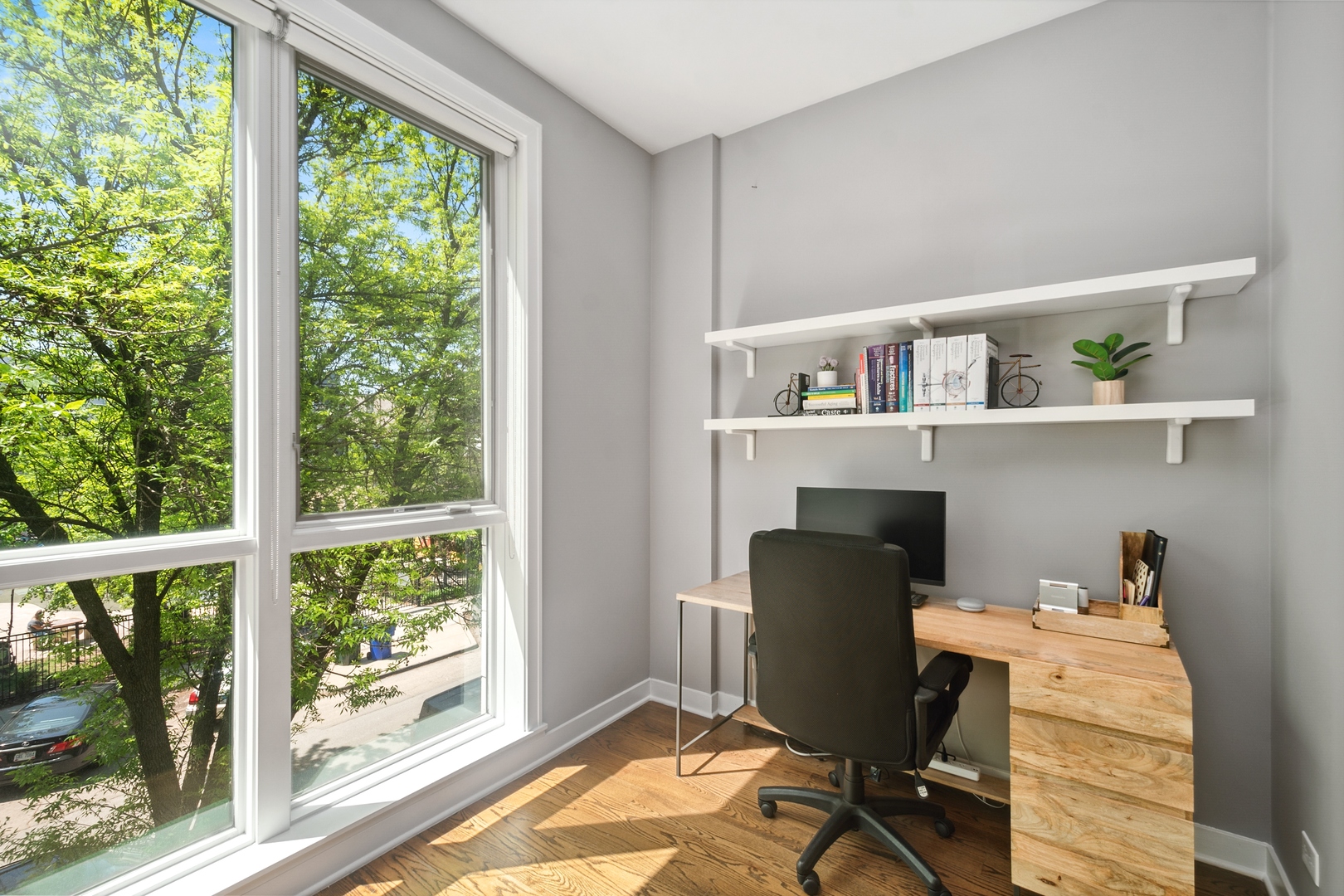 1838 West Rice Street, Unit 2 Chicago, IL 60622 - Photo 7 of 13 a view of a workspace with furniture and a window
