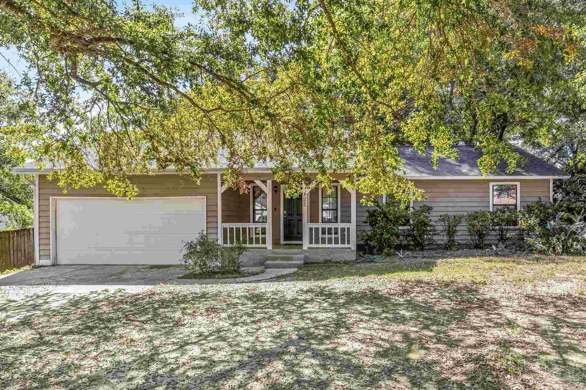 121 Claire Drive Crestview, FL 32536 - Photo 2 of 45 front view of a house with a tree