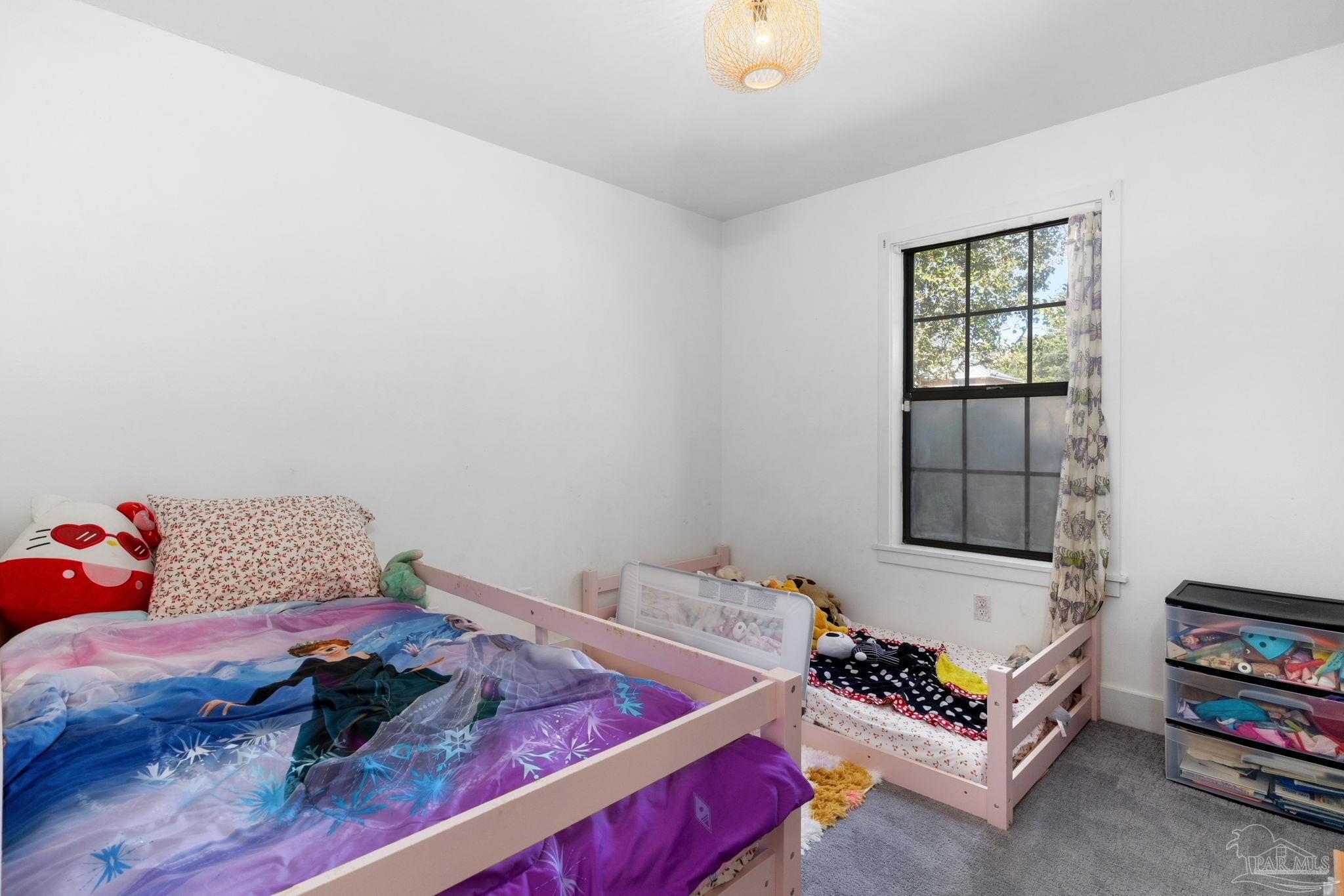 121 Claire Drive Crestview, FL 32536 - Photo 24 of 45 a bedroom with a bed and a window