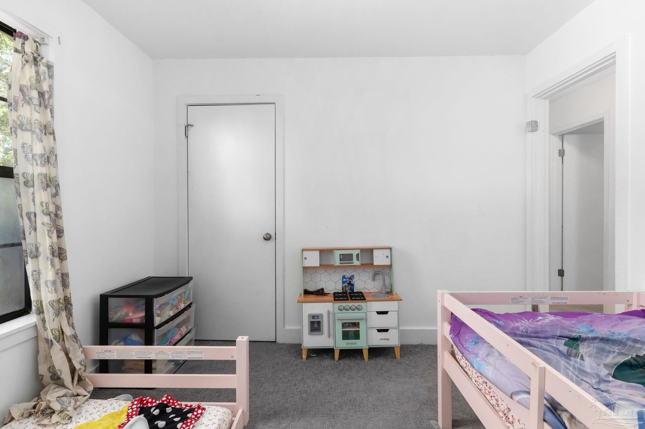 121 Claire Drive Crestview, FL 32536 - Photo 26 of 45 a bedroom with bed and a window