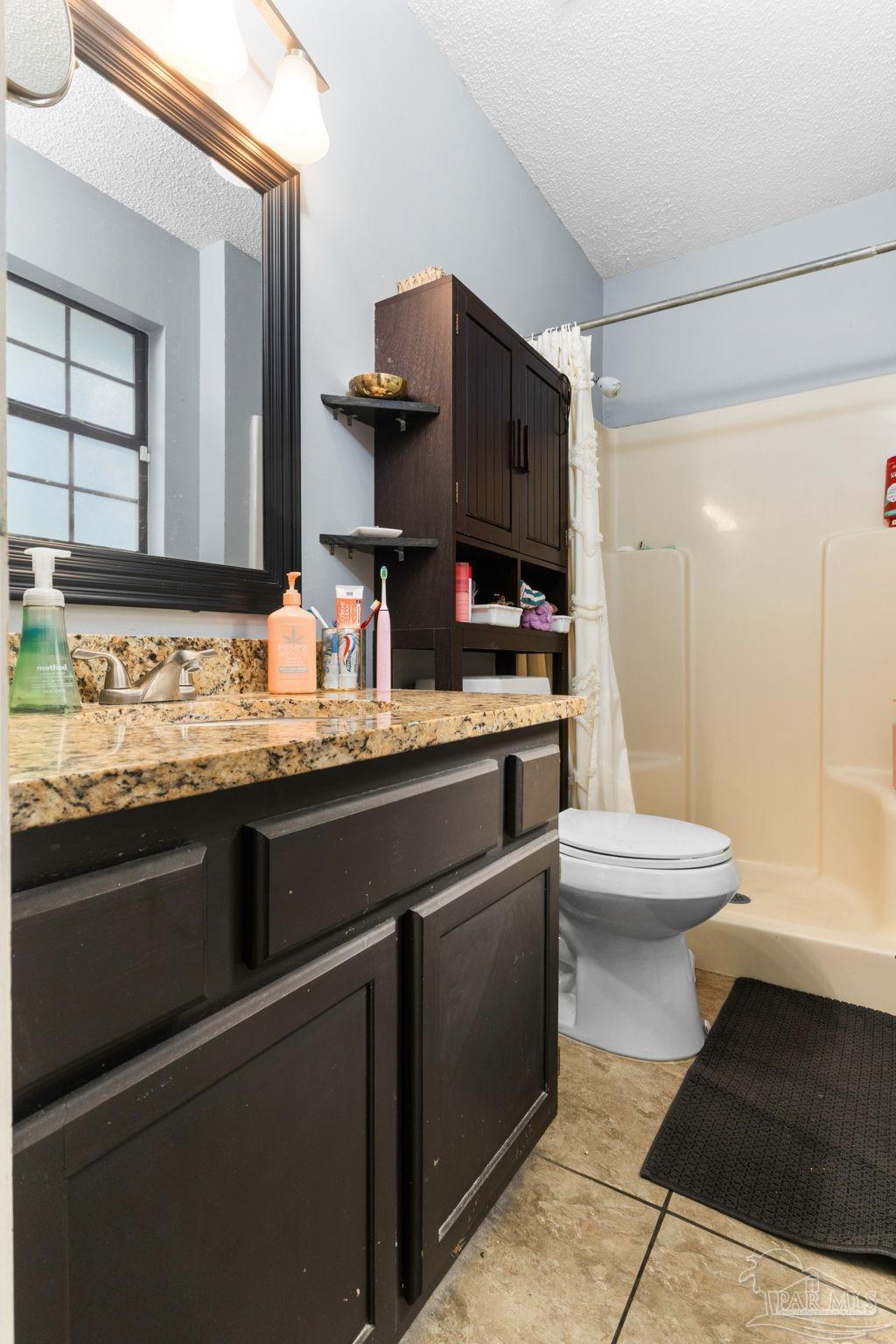121 Claire Drive Crestview, FL 32536 - Photo 32 of 45 a bathroom with a sink and a mirror