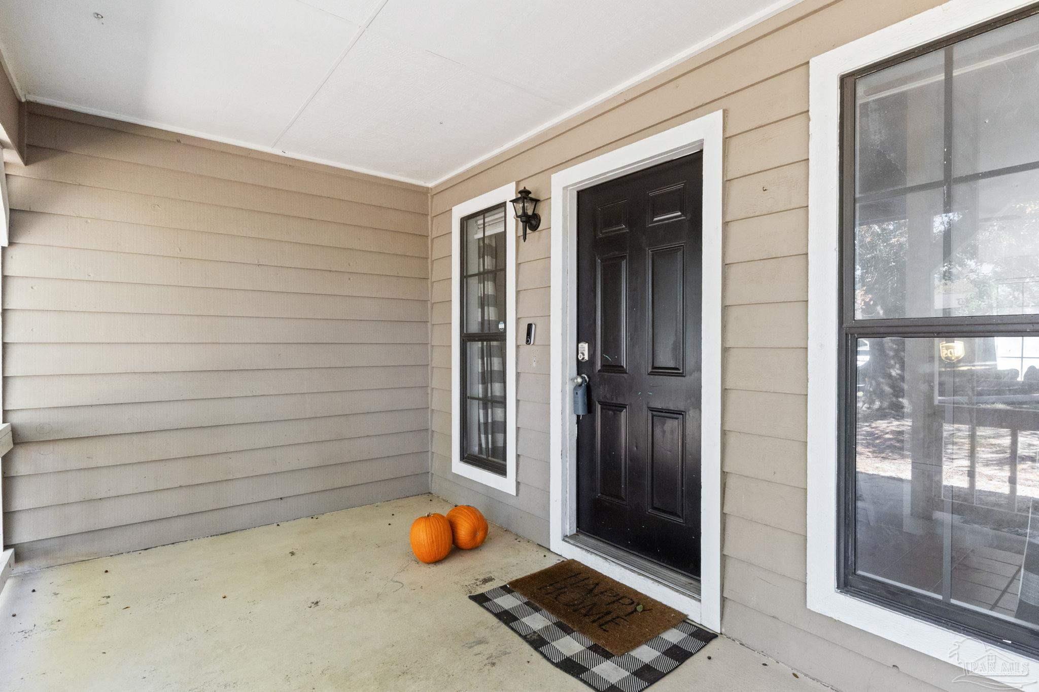 121 Claire Drive Crestview, FL 32536 - Photo 40 of 45 a view of a room with door