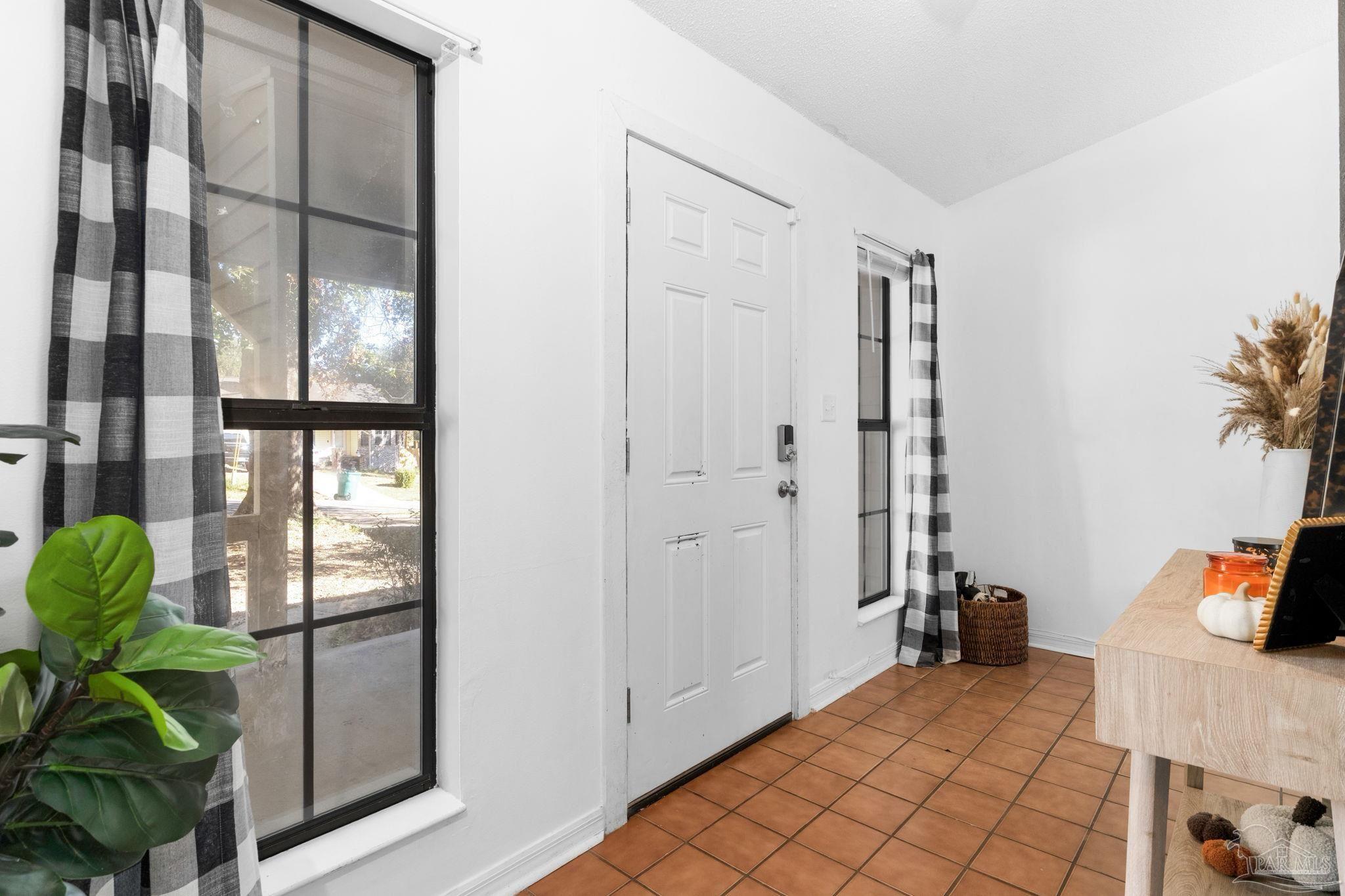 121 Claire Drive Crestview, FL 32536 - Photo 6 of 45 a view of a bedroom with workspace