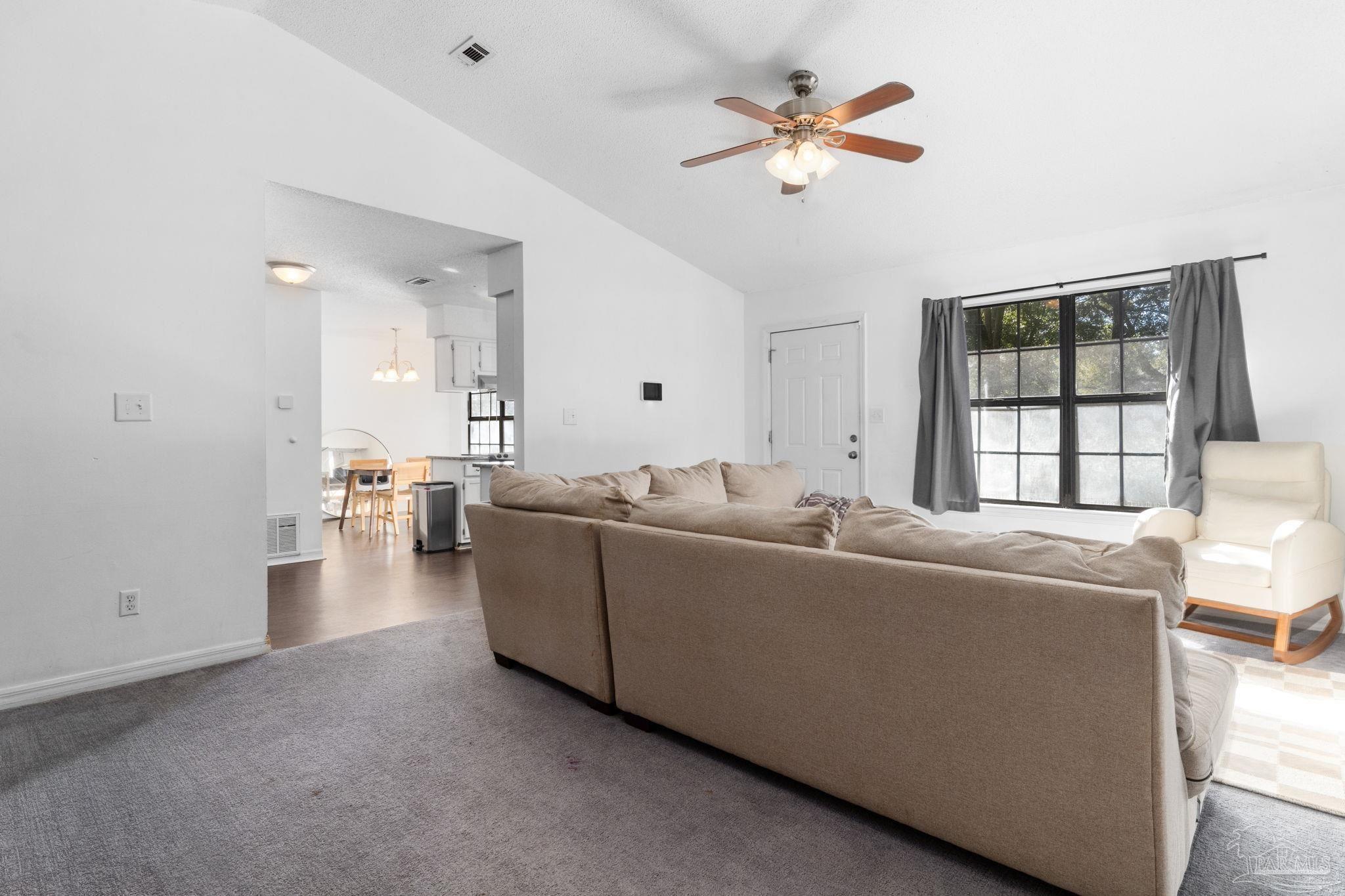 121 Claire Drive Crestview, FL 32536 - Photo 8 of 45 a living room with furniture and a large window