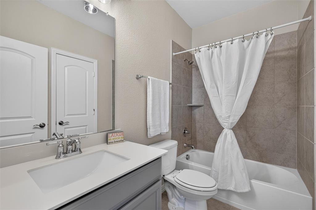 8715 Royal Star Road Rowlett, TX 75089 - Photo 27 of 39 Vanity with an integrated rectangular sink and chrome faucet