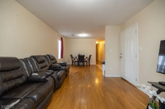 a kitchen with stainless steel appliances granite countertop a stove a sink dishwasher and a refrigerator