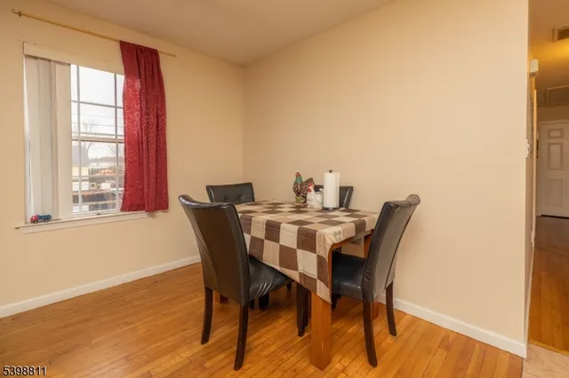 a bedroom with bed and a window