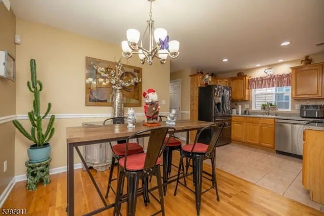 a kitchen with a table and chairs in it