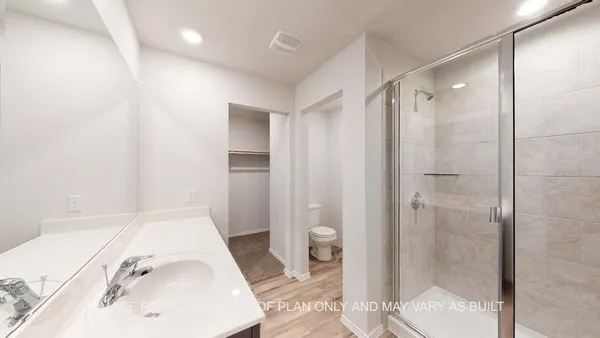 a bathroom with a sink and toilet