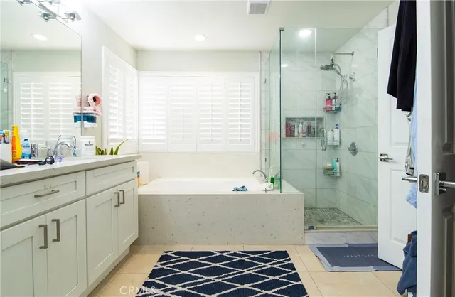a bathroom with a bathtub sink and toilet
