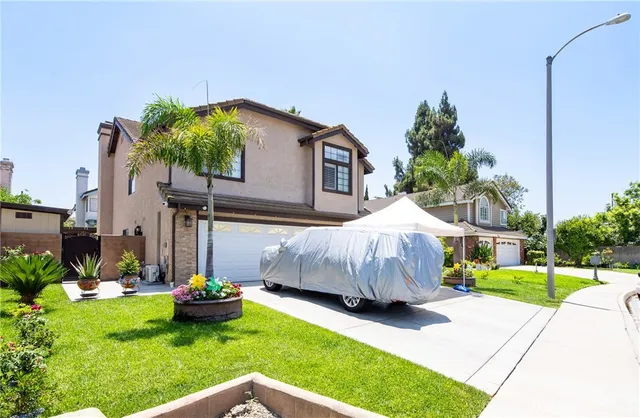 a house view with a garden space
