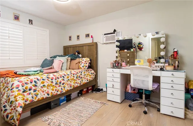 a bedroom with a bed and furniture