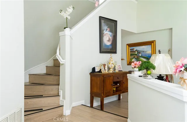 a room with furniture and wooden floor
