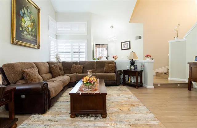a living room with furniture and a couch