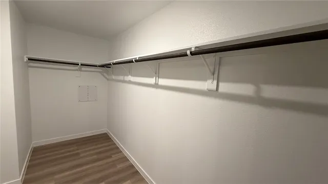 a view of a room with racks on the wall