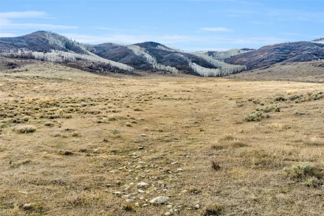 a view of ocean and mountain