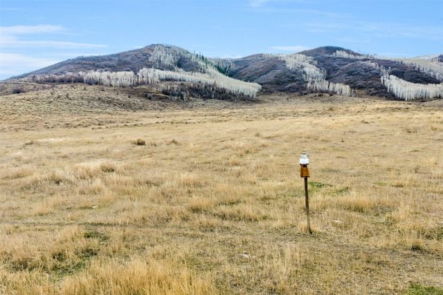 a view of mountains and river