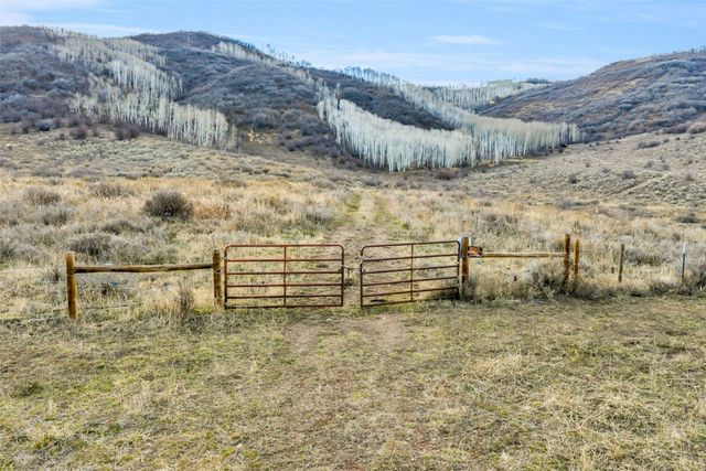 a view of ocean with mountains in the background