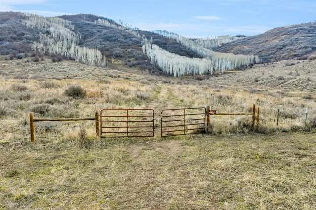 a view of ocean with mountains in the background