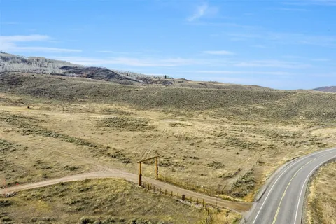 a view of an ocean and a mountain