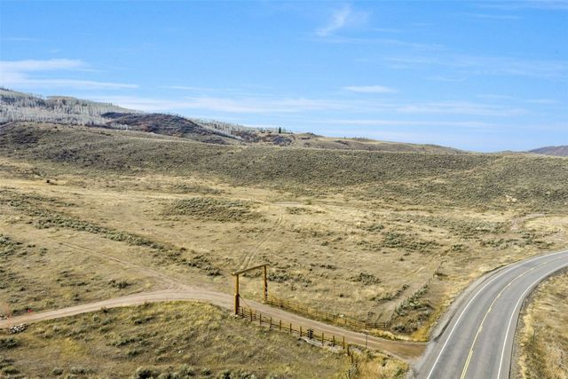 a view of an ocean and a mountain