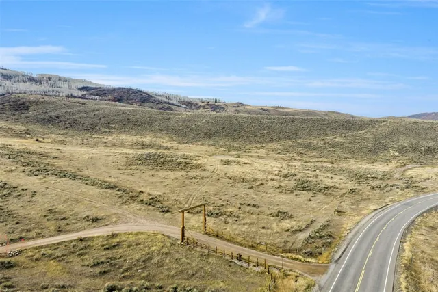 a view of an ocean and a mountain