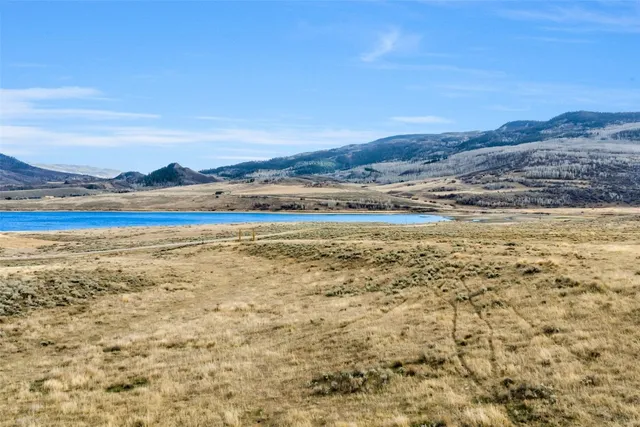 a view of a large body of water and mountain