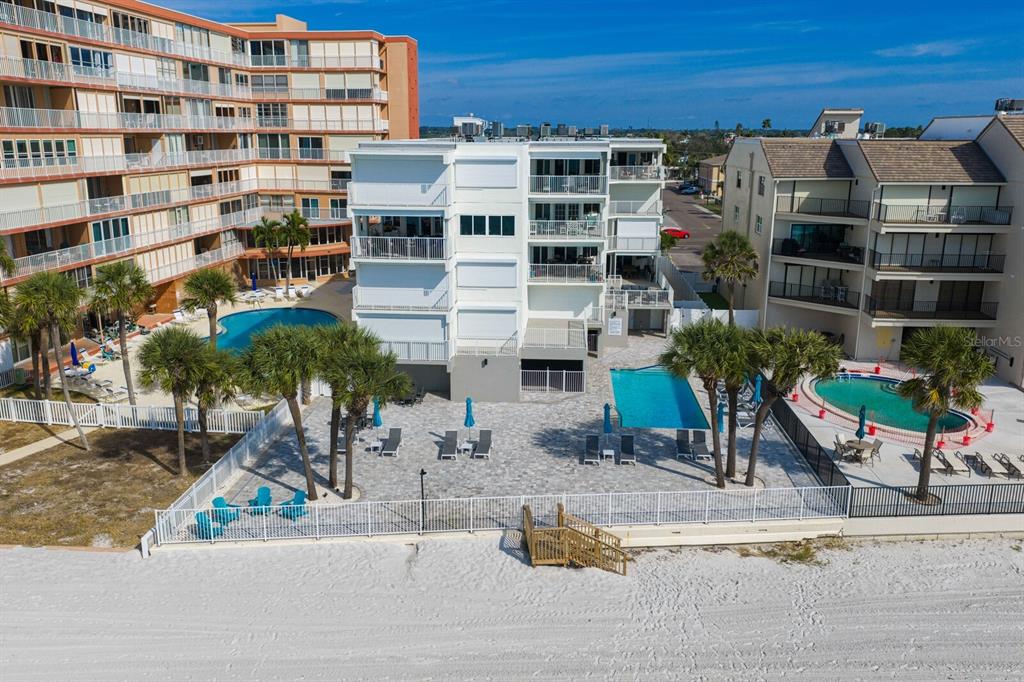 16332 Gulf Boulevard, Unit 3B Redington Beach, FL 33708 - Photo 67 of 91 a front view of a building with street view