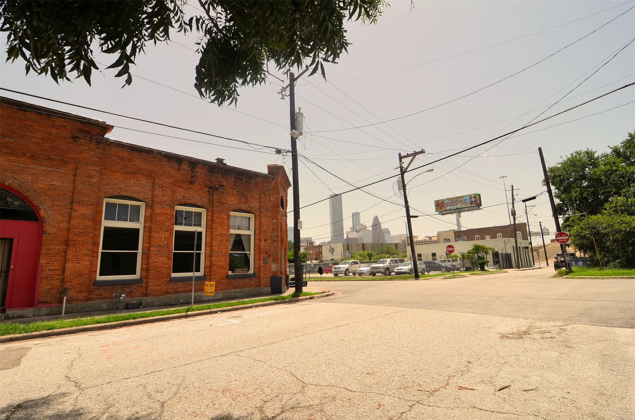 1310 Nance Street, Unit A Houston, TX 77002 - Photo 16 of 18 a view of a street with a building in the background
