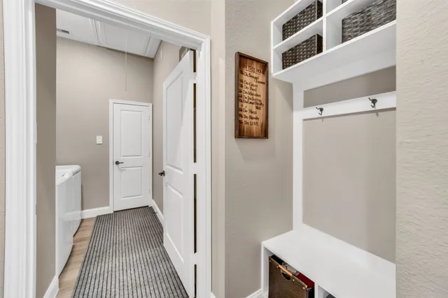 a view of a hallway with entryway