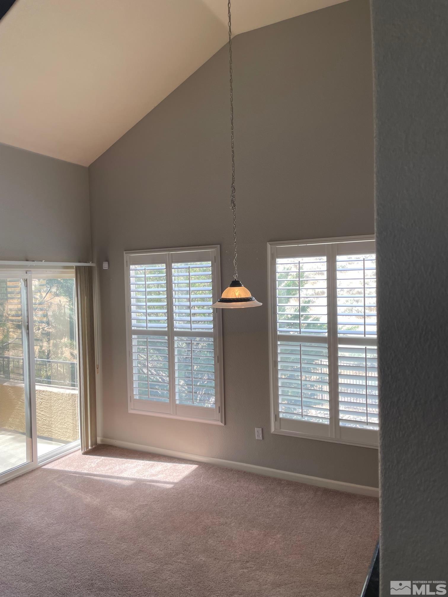 9050 Double R Boulevard, Unit 1024 Reno, NV 89521 - Photo 5 of 32 a view of an empty room with a window