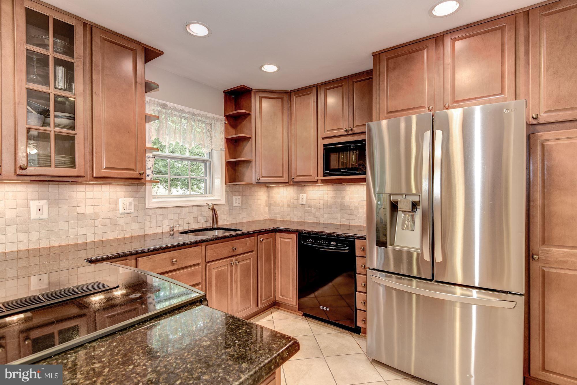11943 Sentinel Point Court Reston, VA 20191 - Photo 11 of 27 Michael Nash Designed Gourmet Kitchen